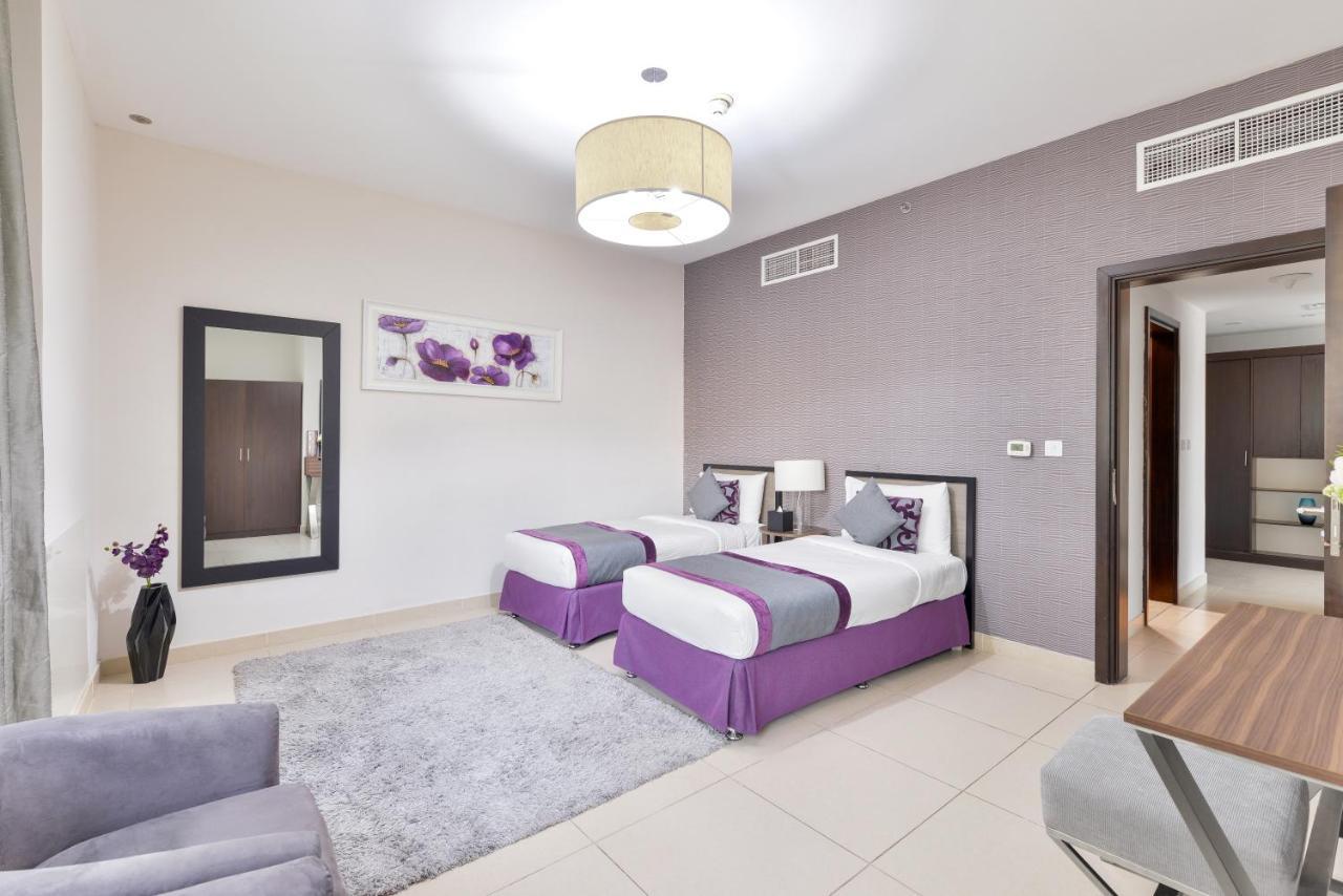 ナシマ タワー ホテル アパートメント ドバイ エクステリア 写真 A bedroom in a typical apartment