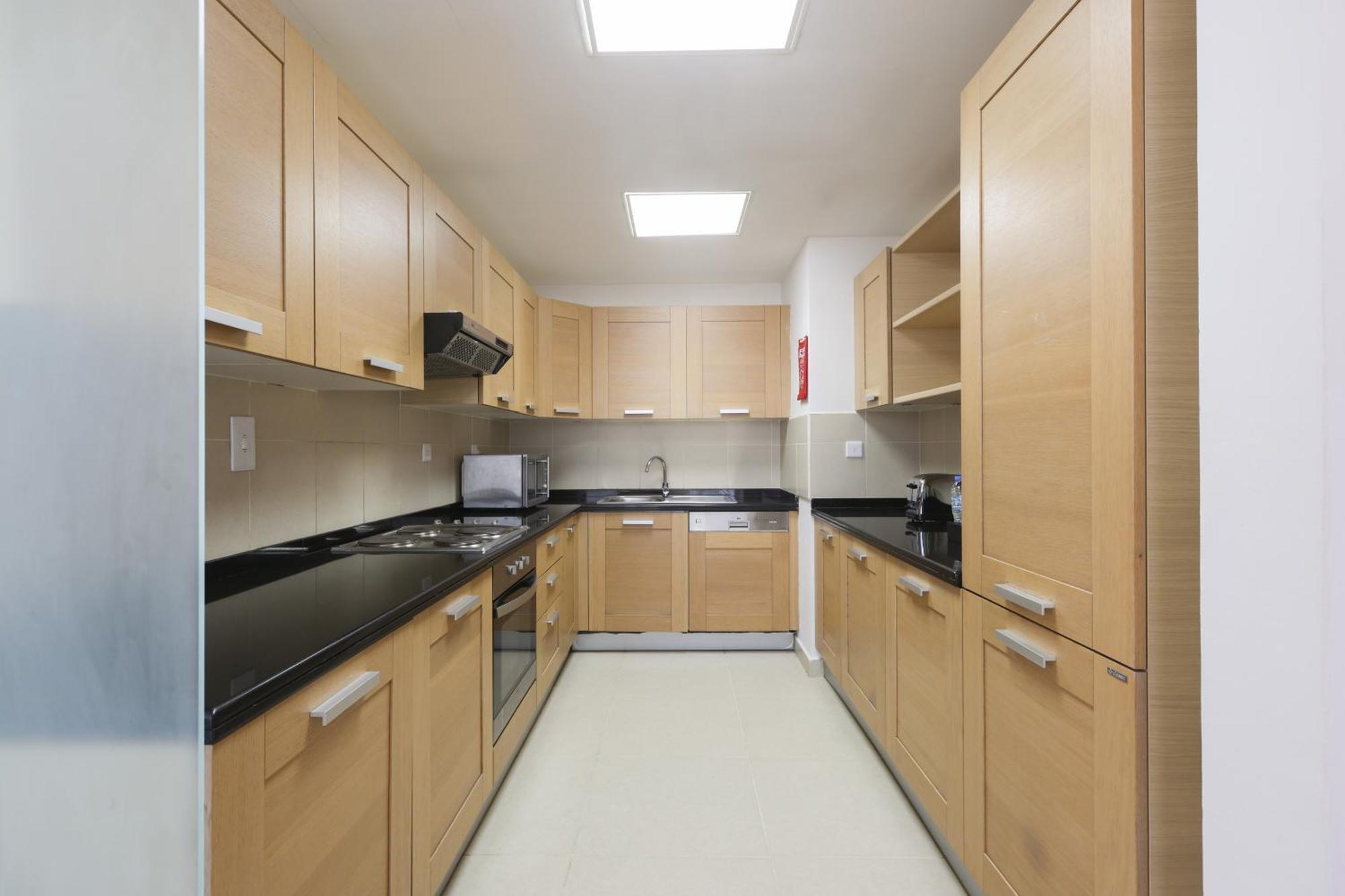 ナシマ タワー ホテル アパートメント ドバイ エクステリア 写真 A typical kitchen in a residential hall